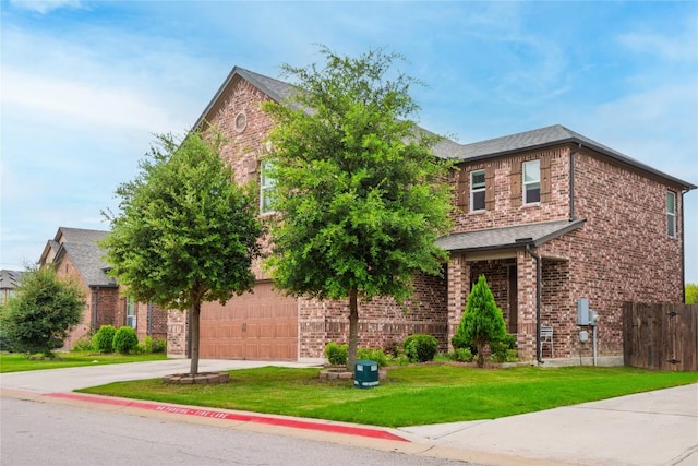 2471 Sunrise Rd Unit 35, Round Rock, TX 78664 - traditional home with driveway, brick siding, and a garage