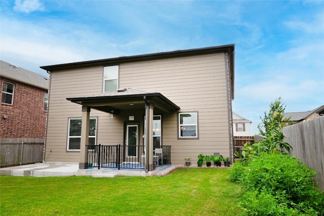 2471 Sunrise Rd Unit 35, Round Rock, TX 78664 - back of property with a patio area and a fenced backyard