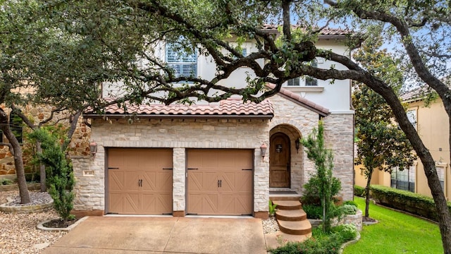 1036 Liberty Park Dr Unit 46, Austin, TX 78746 - mediterranean / spanish home with stone siding, a tiled roof, concrete driveway, and stucco siding