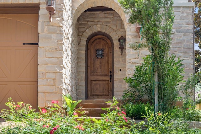 1036 Liberty Park Dr Unit 46, Austin, TX 78746 - entrance to property with stone siding