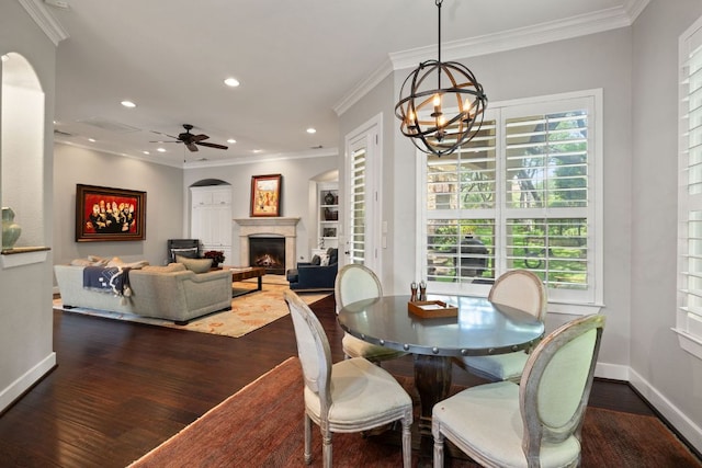 1036 Liberty Park Dr Unit 46, Austin, TX 78746 - dining area featuring a chandelier, dark wood finished floors, ornamental molding, recessed lighting, and ceiling fan