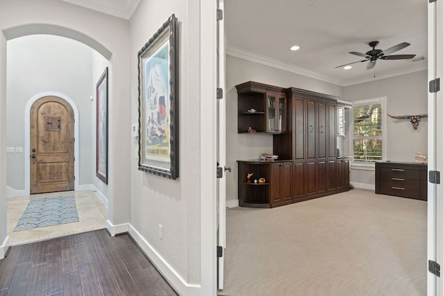 1036 Liberty Park Dr Unit 46, Austin, TX 78746 - corridor with arched walkways, crown molding, recessed lighting, and wood finished floors