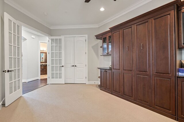 1036 Liberty Park Dr Unit 46, Austin, TX 78746 - unfurnished bedroom with french doors, light carpet, crown molding, recessed lighting, and ceiling fan