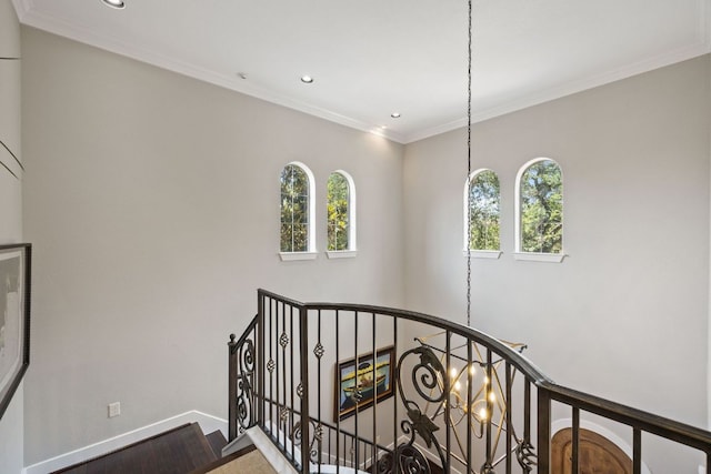 1036 Liberty Park Dr Unit 46, Austin, TX 78746 - staircase featuring plenty of natural light, recessed lighting, crown molding, and wood finished floors