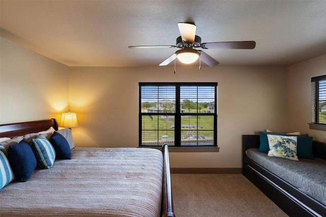 186 Sleepy Oaks Dr, Kingsland, TX 78639 - bedroom featuring carpet floors and a ceiling fan