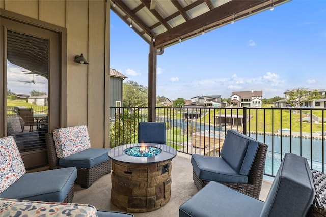 186 Sleepy Oaks Dr, Kingsland, TX 78639 - view of patio / terrace with an outdoor fire pit and a residential view