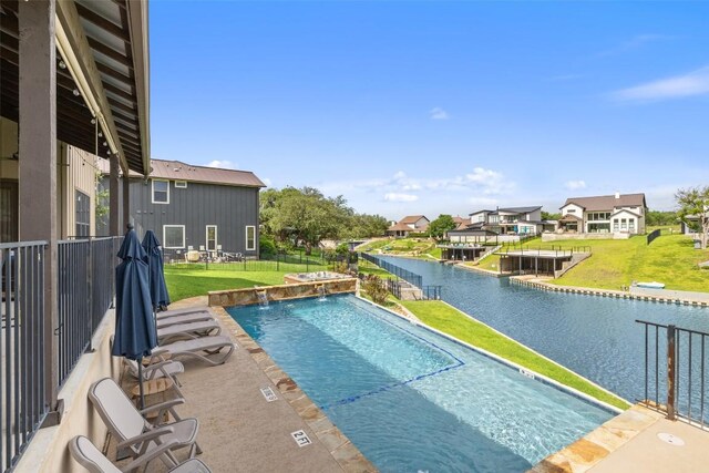 186 Sleepy Oaks Dr, Kingsland, TX 78639 - view of pool with a water view, a yard, and a residential view