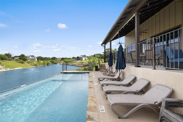 186 Sleepy Oaks Dr, Kingsland, TX 78639 - view of swimming pool with an infinity pool and a water view