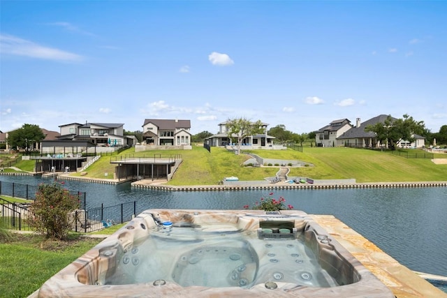 186 Sleepy Oaks Dr, Kingsland, TX 78639 - view of swimming pool featuring a water view, a residential view, and a hot tub