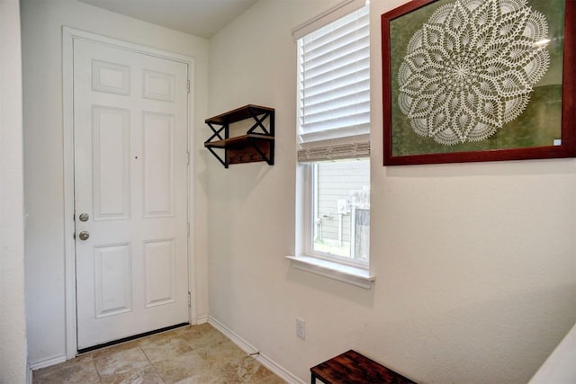 1928 Dragonfly Loop, Bastrop, TX 78602 - doorway with baseboards