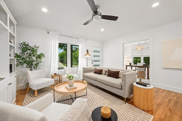 1010 Karen Ave, Austin, TX 78757 - living area featuring light wood finished floors, ceiling fan, and recessed lighting
