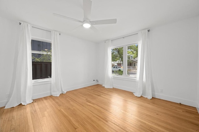 1010 Karen Ave, Austin, TX 78757 - empty room with light wood-style flooring and a ceiling fan