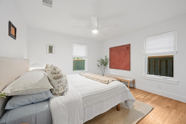 1010 Karen Ave, Austin, TX 78757 - bedroom featuring wood finished floors and a ceiling fan