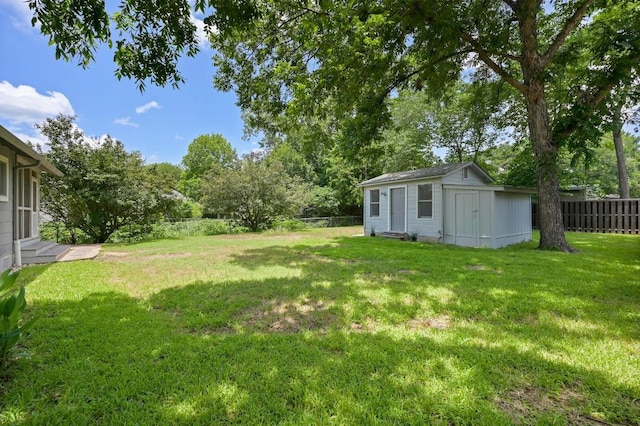 1010 Karen Ave, Austin, TX 78757 - fenced backyard with an outbuilding