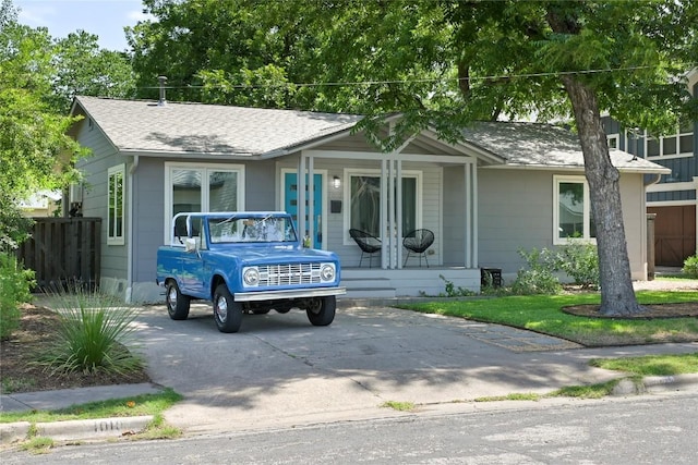 1010 Karen Ave, Austin, TX 78757 - view of front of property featuring covered porch and a shingled roof