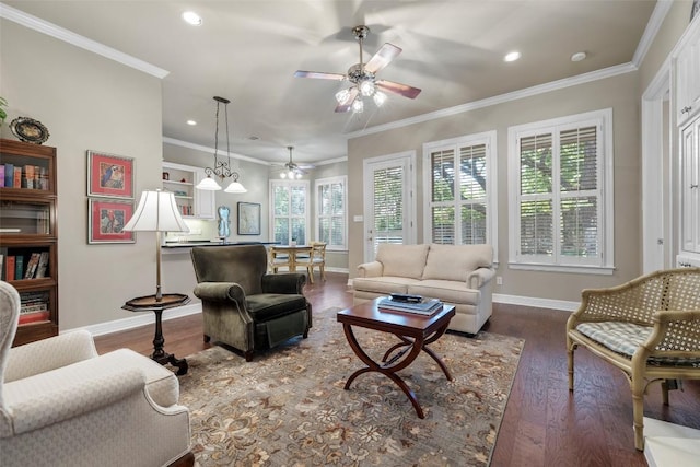7815 Moritz Ln, Austin, TX 78731 - living area featuring a ceiling fan, recessed lighting, crown molding, and wood finished floors