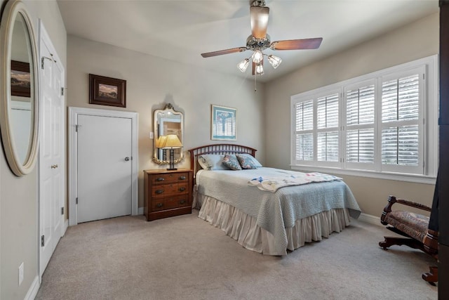 7815 Moritz Ln, Austin, TX 78731 - carpeted bedroom with a ceiling fan and baseboards