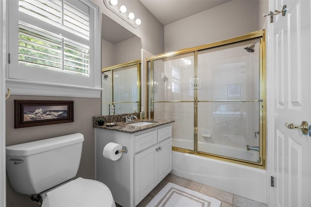 7815 Moritz Ln, Austin, TX 78731 - full bath featuring vanity, combined bath / shower with glass door, and tile patterned floors