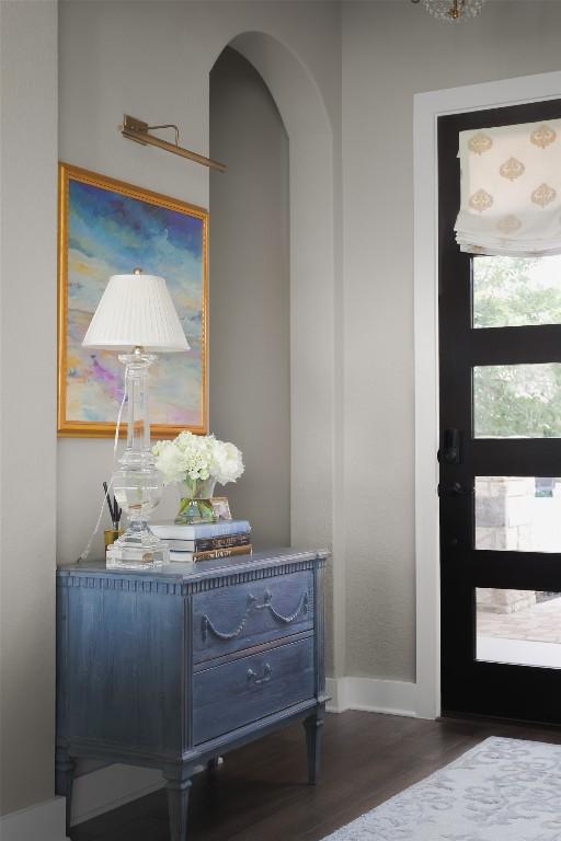 303 Marina View Ct Unit 23A, Austin, TX 78734 - entrance foyer with arched walkways and wood finished floors