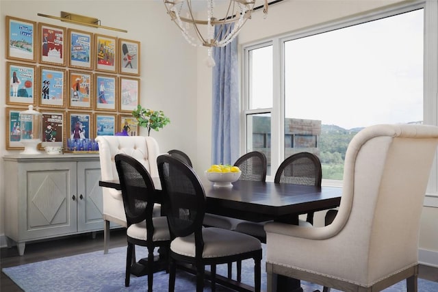 303 Marina View Ct Unit 23A, Austin, TX 78734 - dining room featuring plenty of natural light, a chandelier, and dark wood-type flooring