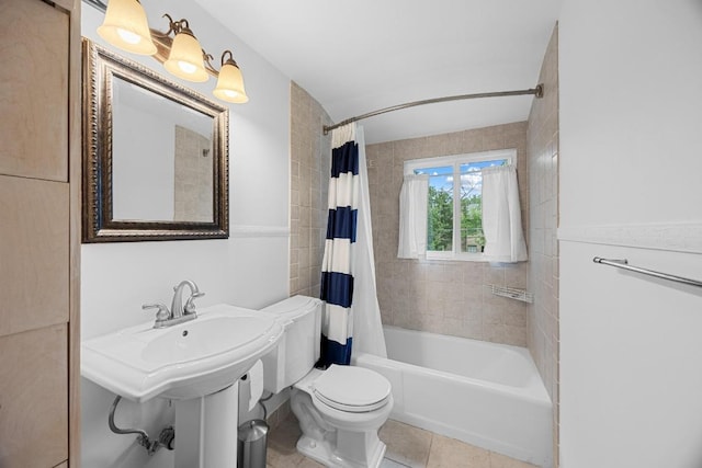 1209 Clearfield Dr, Austin, TX 78758 - bathroom with shower / bath combo with shower curtain and tile patterned floors