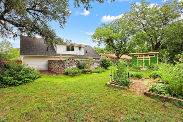 1209 Clearfield Dr, Austin, TX 78758 - view of yard featuring a vegetable garden