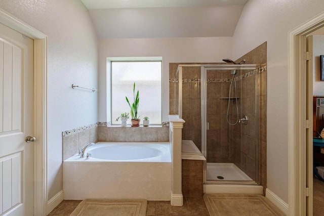 2843 Nolina Ln, Round Rock, TX 78681 - bathroom featuring a garden tub, a stall shower, and tile patterned floors