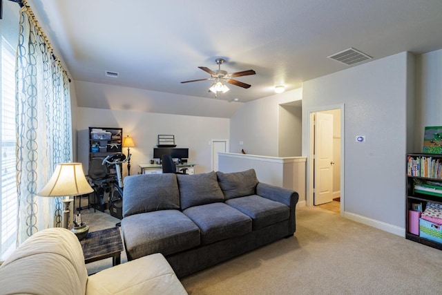 2843 Nolina Ln, Round Rock, TX 78681 - living room with light carpet, ceiling fan, and a desk