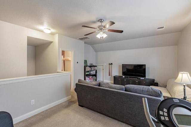 2843 Nolina Ln, Round Rock, TX 78681 - living area with light carpet, ceiling fan, and vaulted ceiling
