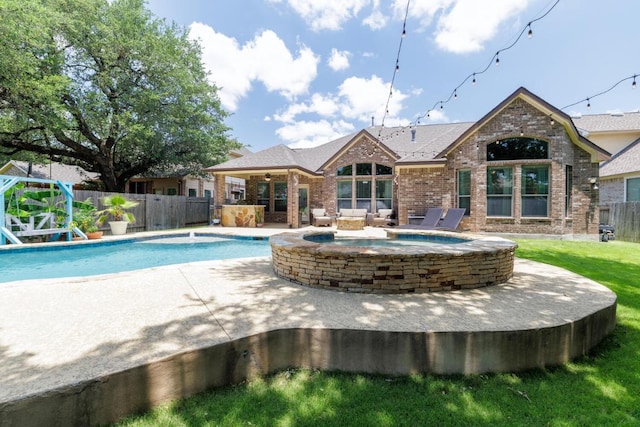 2843 Nolina Ln, Round Rock, TX 78681 - view of swimming pool with an in-ground hot tub, a fenced backyard, a patio, and ceiling fan