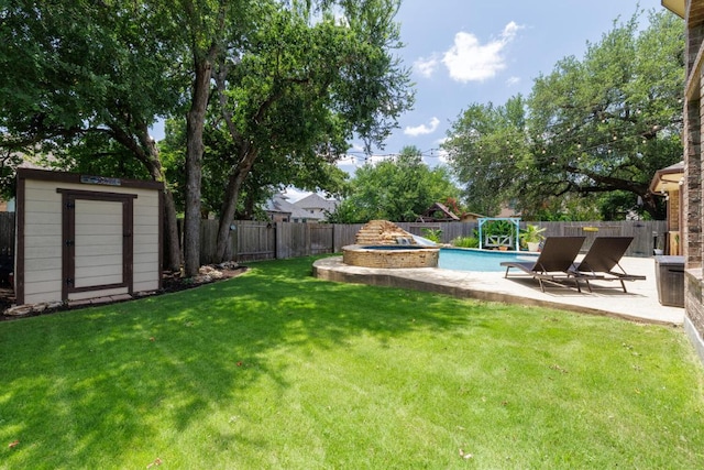 2843 Nolina Ln, Round Rock, TX 78681 - fenced backyard featuring a storage shed, a patio, and a pool with connected hot tub