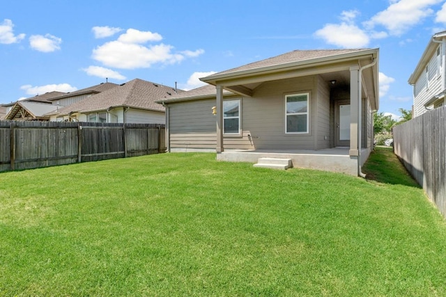 225 Lambert St, Leander, TX 78641 - back of property with a patio area and a fenced backyard