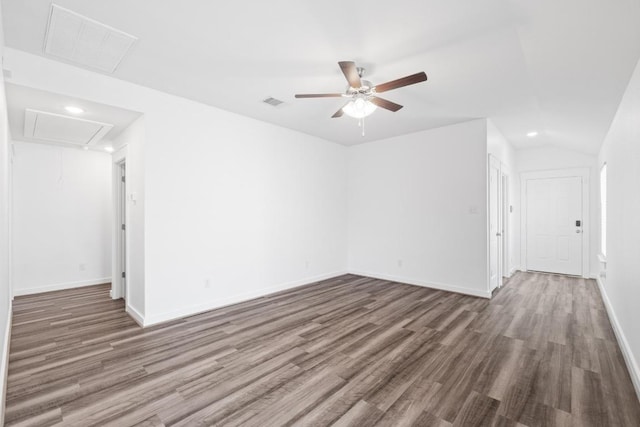 225 Lambert St, Leander, TX 78641 - spare room with attic access, ceiling fan, wood finished floors, recessed lighting, and lofted ceiling