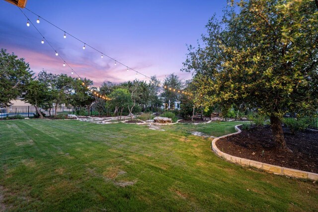 1821 Gilded Crest Dr, Leander, TX 78641 - view of yard at dusk