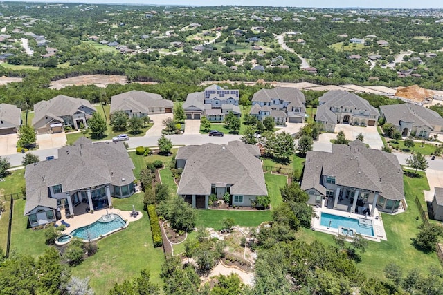 1821 Gilded Crest Dr, Leander, TX 78641 - aerial perspective of suburban area with a pool