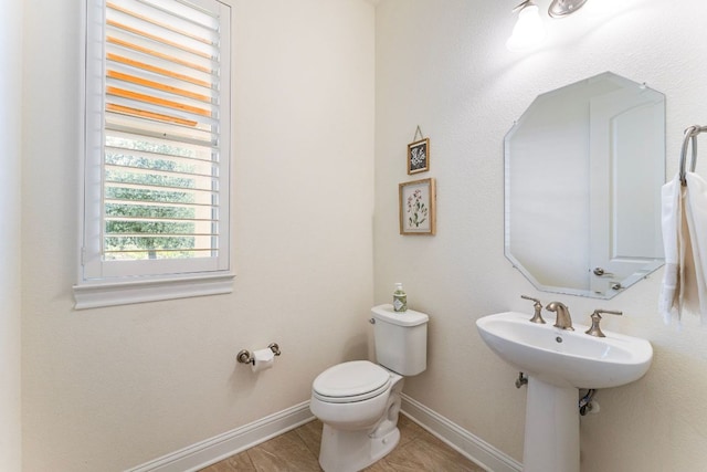 1821 Gilded Crest Dr, Leander, TX 78641 - half bathroom featuring toilet and baseboards
