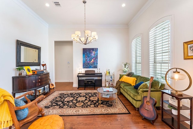 1821 Gilded Crest Dr, Leander, TX 78641 - living area featuring wood finished floors, a chandelier, crown molding, and recessed lighting