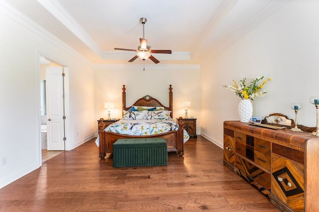 1821 Gilded Crest Dr, Leander, TX 78641 - bedroom with a raised ceiling, wood finished floors, crown molding, and a ceiling fan