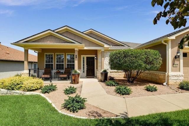 203 Mustang Island Trl, Georgetown, TX 78633 - entrance to property featuring covered porch and stone siding