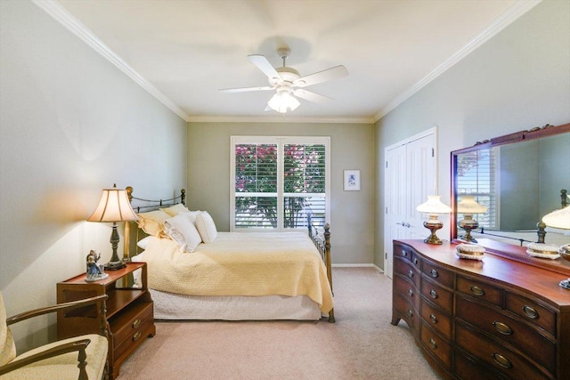 203 Mustang Island Trl, Georgetown, TX 78633 - bedroom featuring light carpet, crown molding, a ceiling fan, and a closet