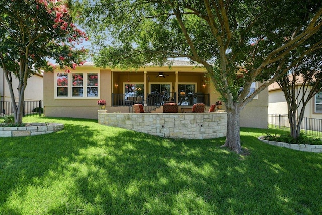 203 Mustang Island Trl, Georgetown, TX 78633 - rear view of property featuring a ceiling fan and stucco siding