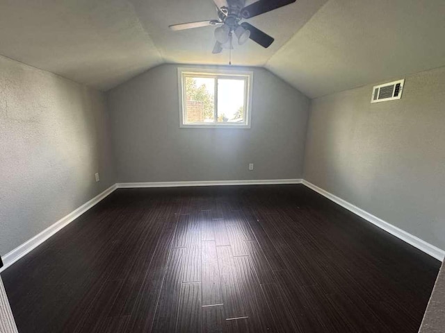 6609 Capriola Dr, Austin, TX 78745 - bonus room with a ceiling fan, vaulted ceiling, and dark wood-type flooring