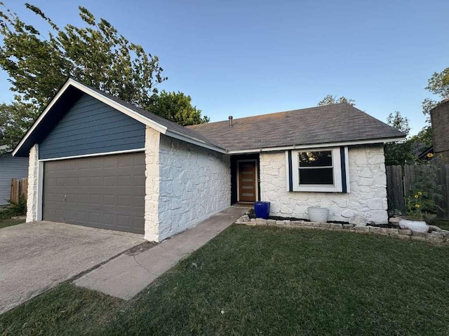 6609 Capriola Dr, Austin, TX 78745 - ranch-style home featuring stone siding, a shingled roof, and an attached garage