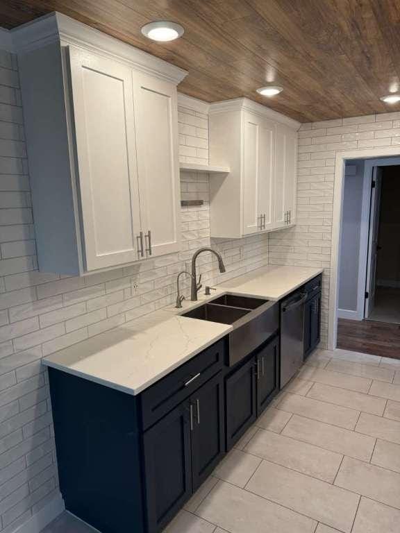 6609 Capriola Dr, Austin, TX 78745 - kitchen featuring wood ceiling, dishwasher, white cabinetry, recessed lighting, and backsplash