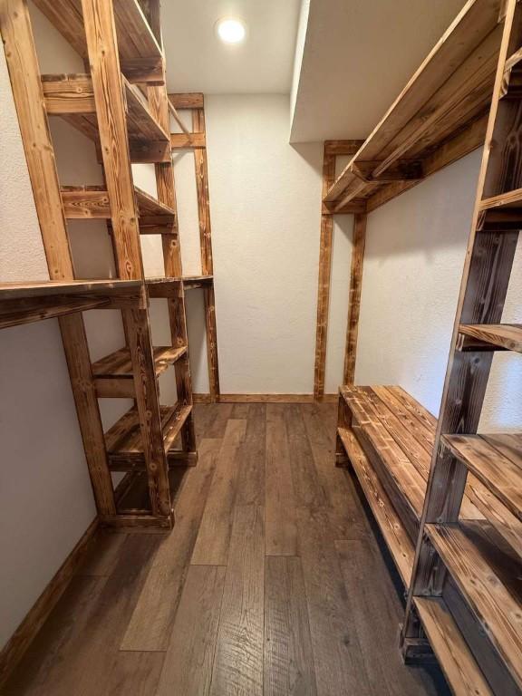 6609 Capriola Dr, Austin, TX 78745 - spacious closet featuring wood-type flooring