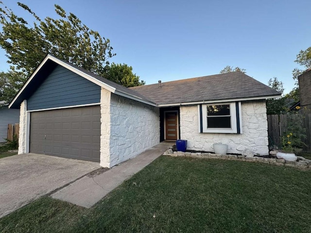 6609 Capriola Dr, Austin, TX 78745 - single story home featuring stone siding, an attached garage, a shingled roof, and concrete driveway