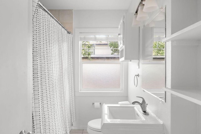 506 W 51st St Unit A, Austin, TX 78751 - bathroom with plenty of natural light and a shower with shower curtain