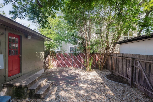 506 W 51st St Unit A, Austin, TX 78751 - fenced backyard featuring entry steps