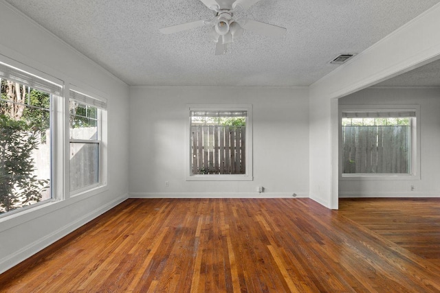506 W 51st St Unit A, Austin, TX 78751 - spare room with a textured ceiling, wood finished floors, and ceiling fan