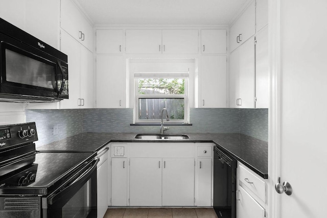 506 W 51st St Unit A, Austin, TX 78751 - kitchen featuring black appliances, dark countertops, white cabinets, decorative backsplash, and light tile patterned floors